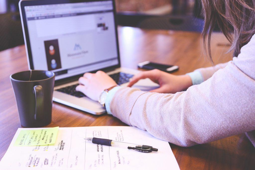 lady typing on laptop