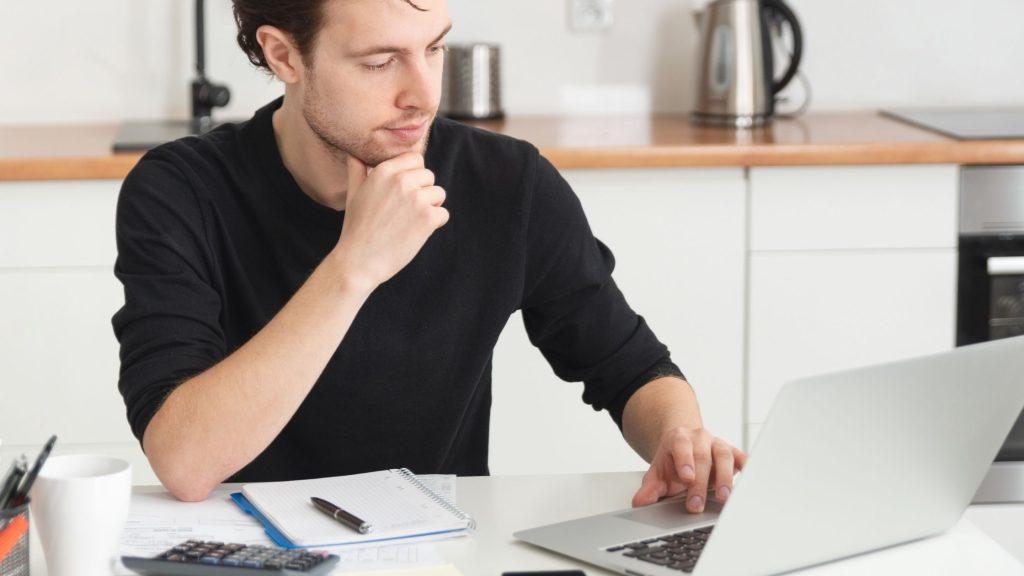 man working on laptop