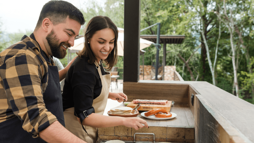 couple in outdoor kitchen