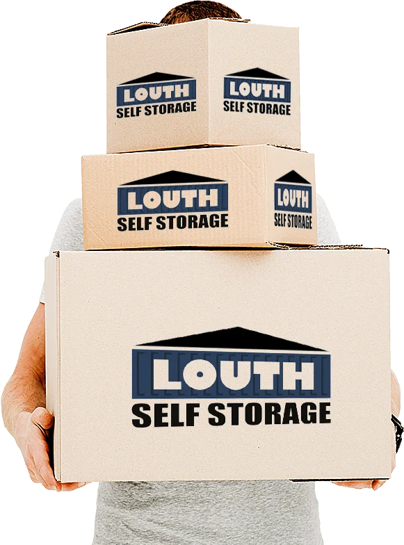 Man holding Louth Self Storage boxes
