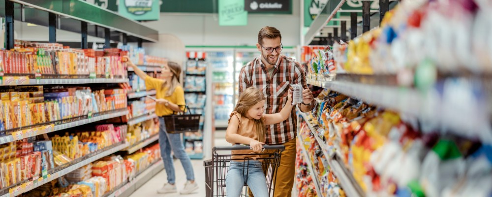 Father and daughter doing grocery shopping