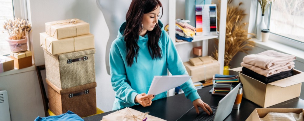 A woman packing for her online business