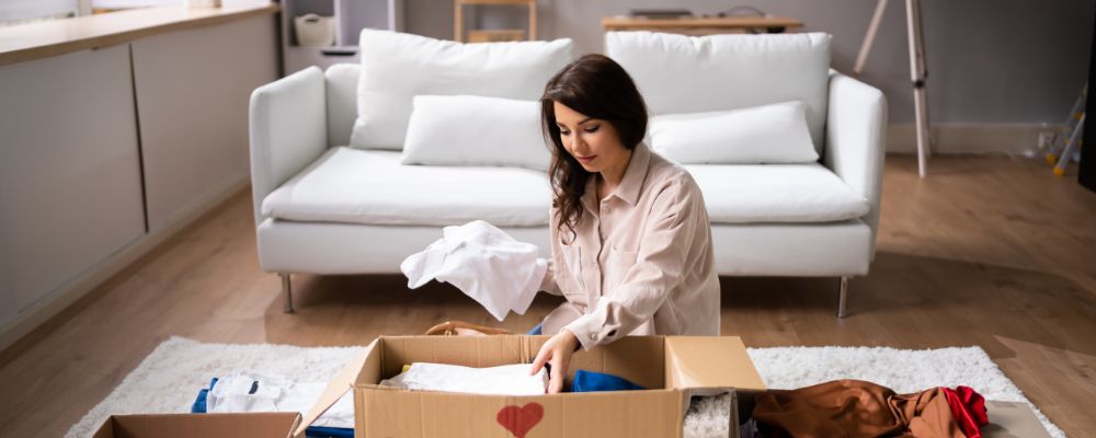 A woman decluttering her house