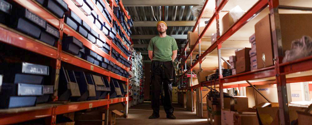 A small business owner operating from a business storage unit at Louth Self Storage.