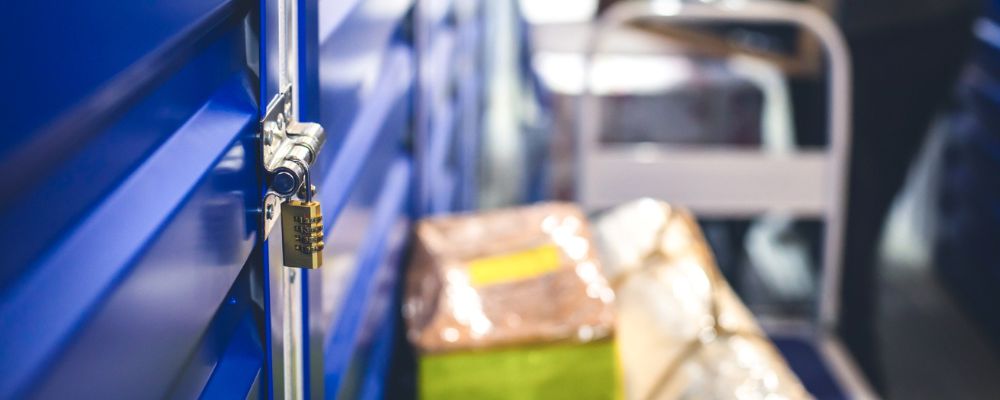 Someone packing their insured belongings into a storage unit at Louth Self Storage 