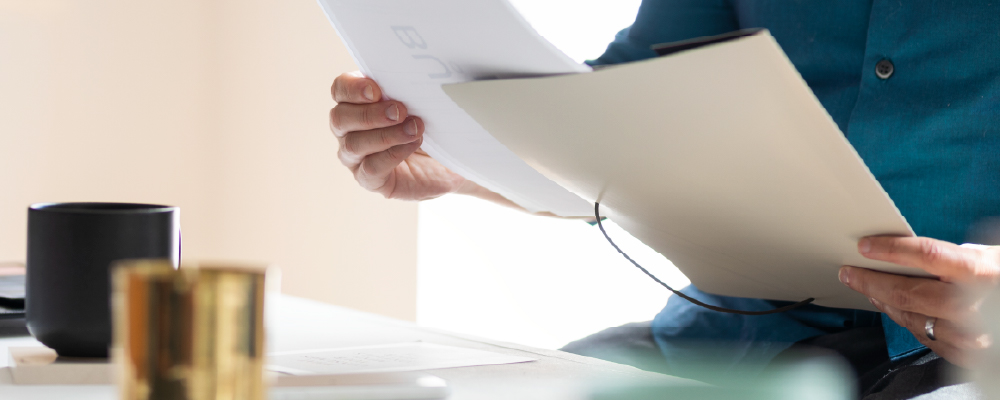 A customer going through their insurance documentation