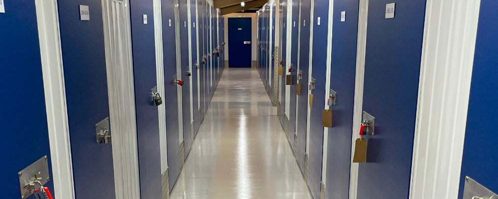 A hallway of Louth indoor storage units with blue doors