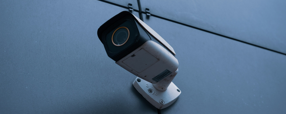 A wall-mounted CCTV camera monitoring Louth Self Storage
