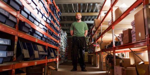 A small business owner operating from a business storage unit at Louth Self Storage.