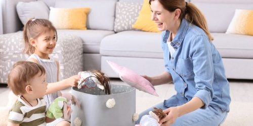 A mother playing with their child in a clutter-free living room
